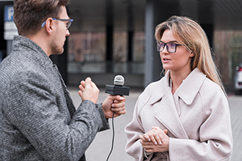 side-view-journalist-doing-interview 1